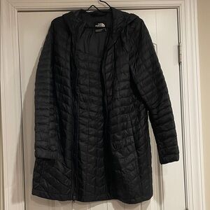 The North Face Women's Black Long Thermoball coat.